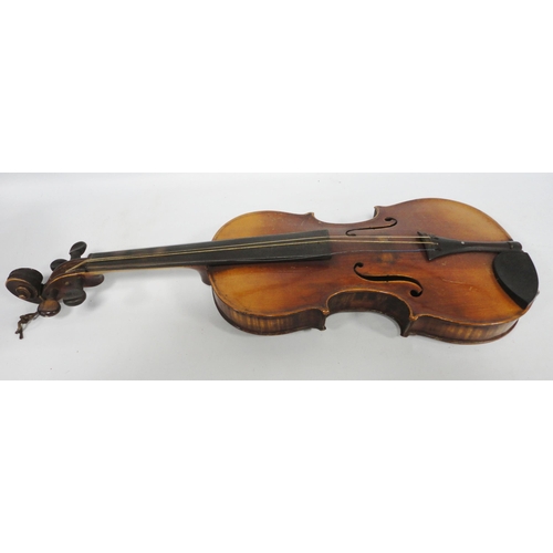 255 - Antique two-piece violin and bow, stamped Tourte to the bow, the ebony frog piece inlaid with mother... 