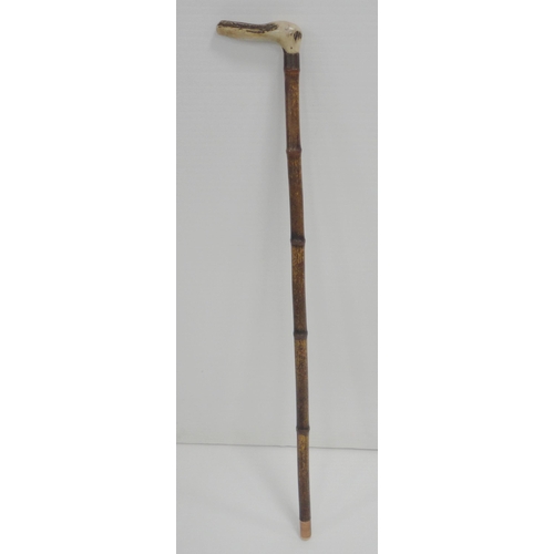 306 - Bamboo and antler-handled walking cane with graduation for measuring the height of horses, 94cm, a r... 