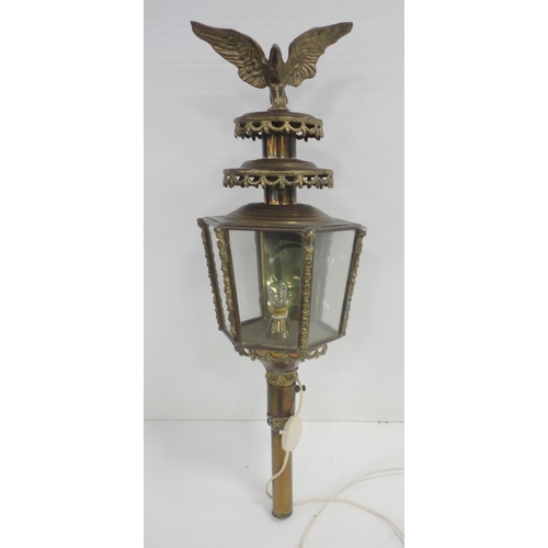 314 - Brass carriage lamp with eagle surmount and hexagonal glazed tapered sides, probably of German origi... 