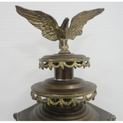 314 - Brass carriage lamp with eagle surmount and hexagonal glazed tapered sides, probably of German origi... 