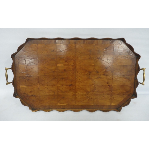 309 - Victorian walnut crossbanded serving tray, the centre with oyster veneered inlay, with wavy edge and... 