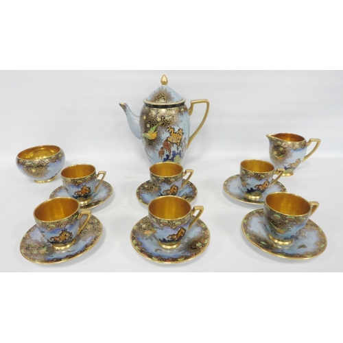 234 - Carlton Ware 'Paradise Bird' pattern coffee set depicting a flying bird in colourful enamels in a st... 