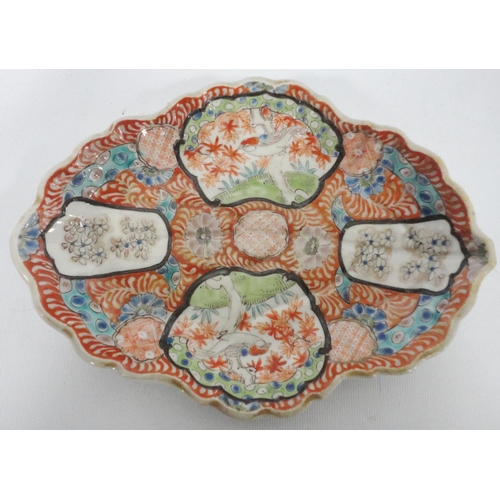 198 - Japanese Fukugawa oval dish (Meiji, 1868 - 1912) with wavy rim, decorated with blossoms and birds in... 