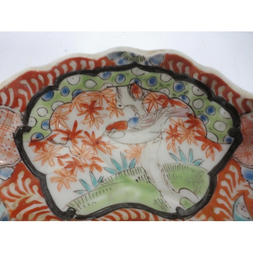 198 - Japanese Fukugawa oval dish (Meiji, 1868 - 1912) with wavy rim, decorated with blossoms and birds in... 