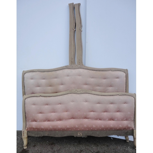 462 - French painted double bed with pink padded button back to each end, foliate appliques to the frame, ... 