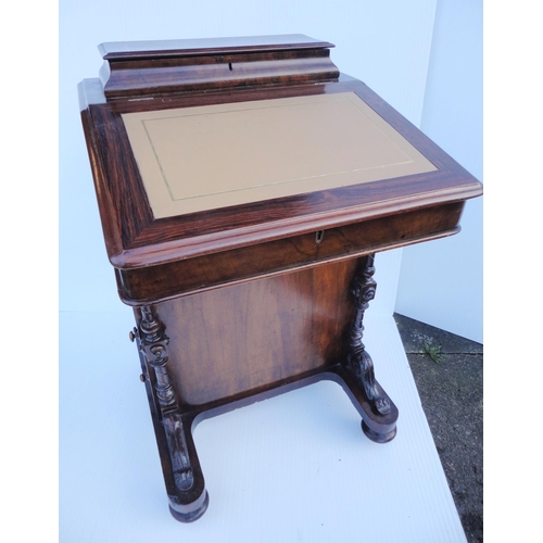 463 - Victorian mahogany davenport, the hinged desk stand above a flap enclosing bird's eye maple-lined dr... 