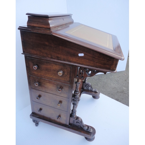 463 - Victorian mahogany davenport, the hinged desk stand above a flap enclosing bird's eye maple-lined dr... 