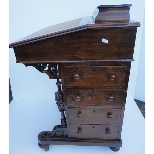 463 - Victorian mahogany davenport, the hinged desk stand above a flap enclosing bird's eye maple-lined dr... 