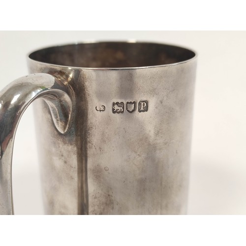 100 - Silver plain mug with loop handle, not inscribed. 1910, 196g, 6oz.