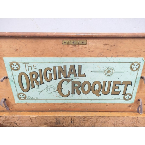 400 - The Original Croquet set by F.H Ayres - London, Housing mallets, balls etc, with original label to t... 