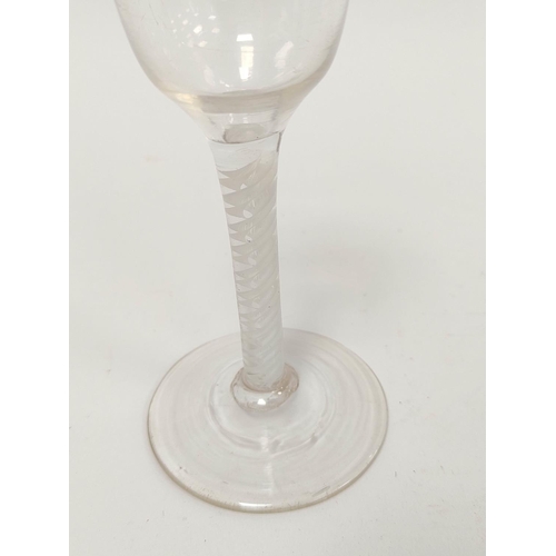 412 - Georgian wine glass with ogee bowl on opaque air twist column and conical foot, 14.5cm high.