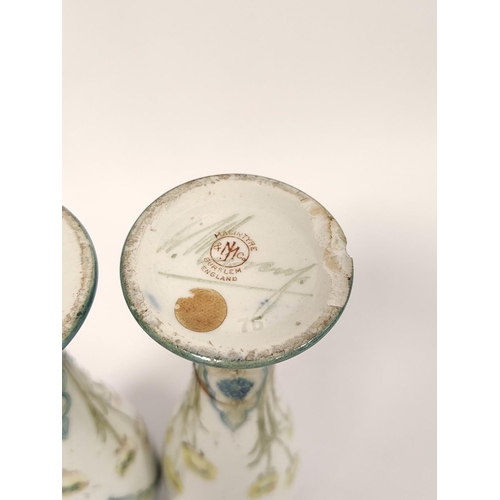 329 - Pair of William Moorcroft for MacIntyre Florian ware vases from the Art Nouveau era, the tapered bal... 