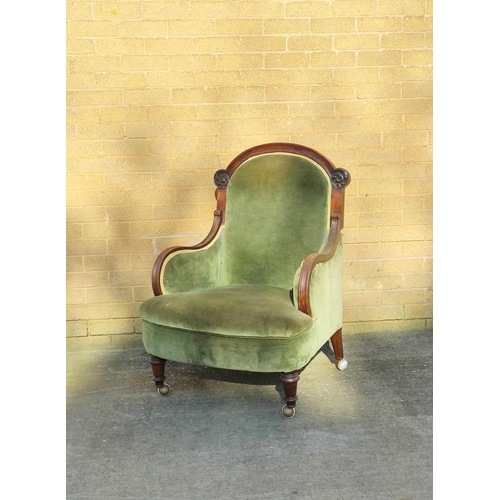 505 - Victorian mahogany framed armchair with shaped top rail and armrests, flanked with a scroll roundel,... 