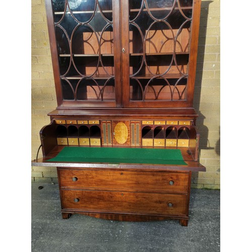 517 - Georgian mahogany secretaire bookcase, the bookcase top section with two astragal glazed doors enclo... 