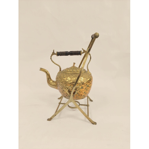 398 - Late Victorian hammered brass tea kettle of ovoid shape upon rustic stand with turned ebony handles ... 