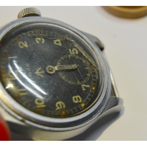 185 - WWII period 'Dirty Dozen' British military-issue manual wind watch head by Timor, in stainless steel... 