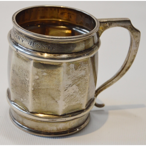 83 - Silver embossed christening mug, Birmingham 1903, and another, Sheffield 1930, 256g.  (2)