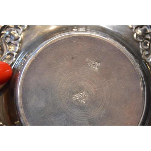 84 - Three silver bon-bon dishes (124g) and a specimen vase.  (4)