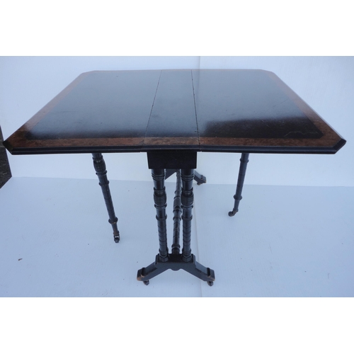 467 - 19th century Aesthetic movement ebonised Sutherland table, crossbanded in walnut, on turned columns ... 