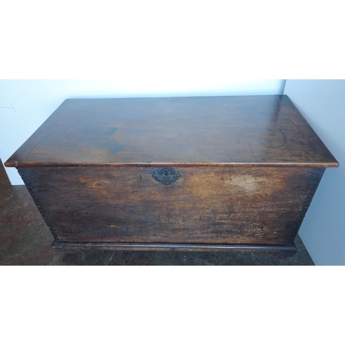 472 - Victorian stained wood blanket chest with hinged top, on castors, 65cm high, approximately 125cm wid... 