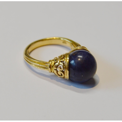 153 - Greek 18ct gold ring of Etruscan style by Illias Lalaounis with lapis ball between pierced cups, Imp... 