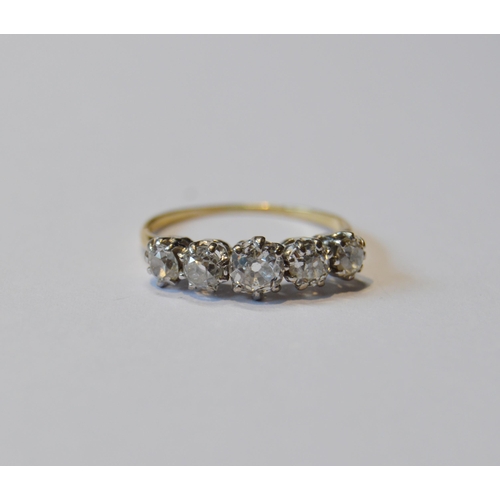 157 - Diamond five-stone ring with graduated brilliants, in gold, size P.