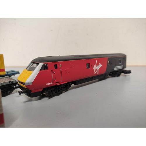 244 - Box of 00 gauge rolling stock mostly by Hornby to include a Virgin Trains Mk3a DVT driving van 82141... 