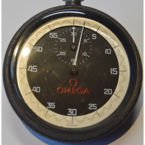 187 - Omega metal-cased stopwatch, the black dial with seconds dial and silvered outer track, single push ... 