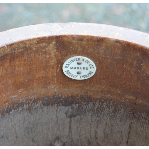 475 - Oak coopered barrel-top metal-bound jardinière stand by RA Lister & Co., Dursley, England... 