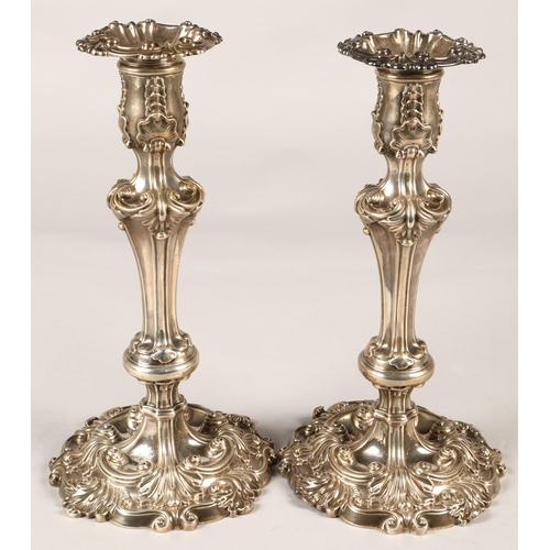 180 - Pair of ornate Georgian silver weighted candlesticks , assay marked Sheffield 1824, maker Waterhouse... 