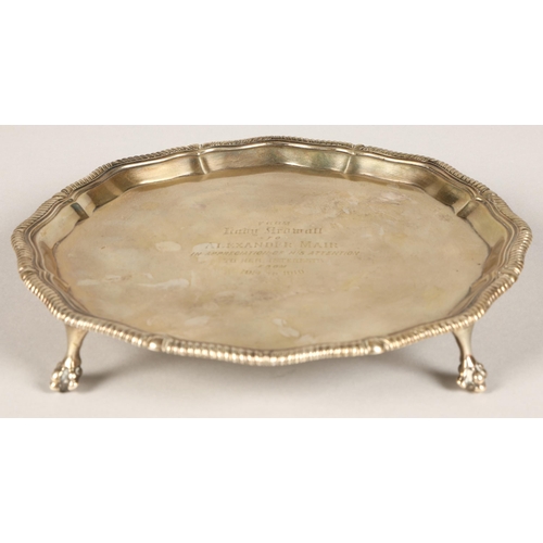 171 - Silver salver raised on four feet with centre inscription, assay marked London 1917, maker Thomas Br... 