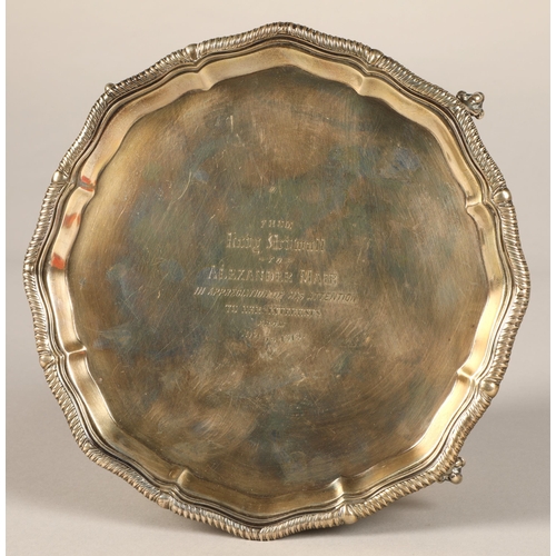 171 - Silver salver raised on four feet with centre inscription, assay marked London 1917, maker Thomas Br... 