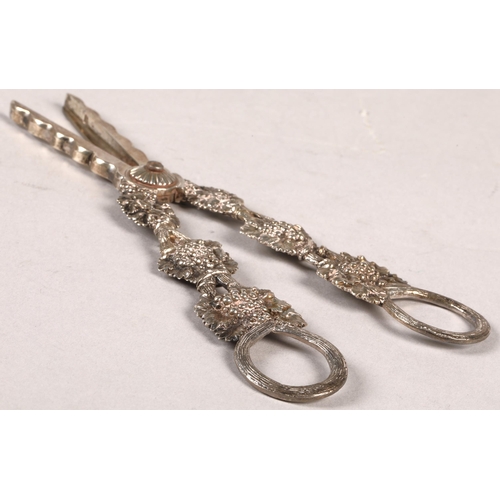 176 - George IV ornate silver grape scissors, assay marked London 1821, with foliage design, 18cm length, ... 