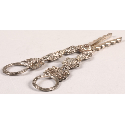 176 - George IV ornate silver grape scissors, assay marked London 1821, with foliage design, 18cm length, ... 