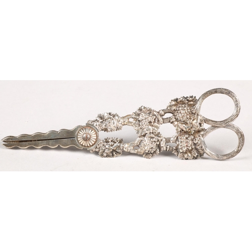 176 - George IV ornate silver grape scissors, assay marked London 1821, with foliage design, 18cm length, ... 