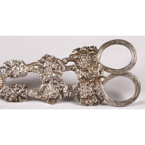 176 - George IV ornate silver grape scissors, assay marked London 1821, with foliage design, 18cm length, ... 