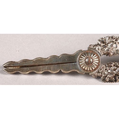 176 - George IV ornate silver grape scissors, assay marked London 1821, with foliage design, 18cm length, ... 