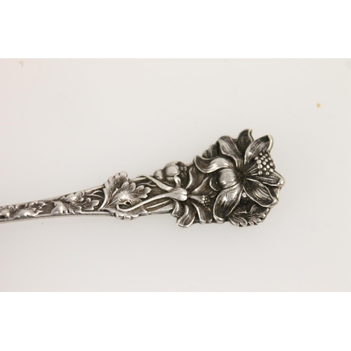 609 - American sterling silver spoon, makers Baker Manchester Mfg., together with three hallmarked silver ... 