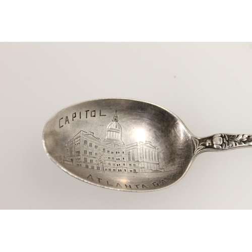 609 - American sterling silver spoon, makers Baker Manchester Mfg., together with three hallmarked silver ... 