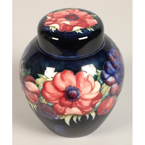 4 - Moorcroft pottery ginger jar with cover, blue ground with tube-lines stylised flowers, impressed mar... 