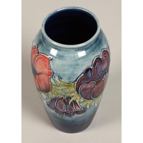 6 - Moorcroft pottery vase of baluster form, pale blue ground in the anemone pattern, impressed marks wi... 