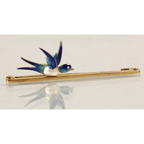 89 - Ladies 15ct gold bar brooch with mounted enameled swallow, 3.9 grams.