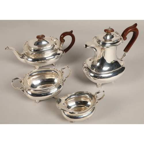 182 - Three piece silver tea service with silver plated coffee pot, assay marked Sheffield 1930, maker Joh... 