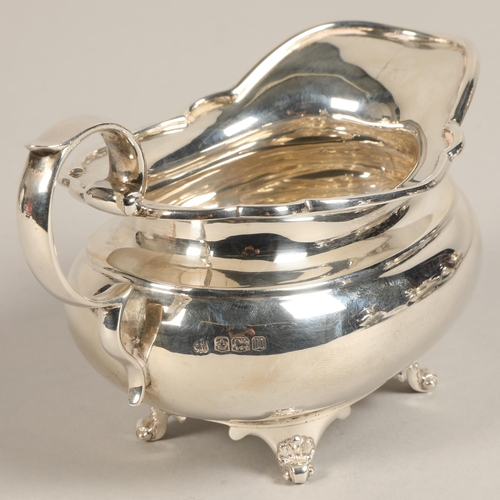 182 - Three piece silver tea service with silver plated coffee pot, assay marked Sheffield 1930, maker Joh... 