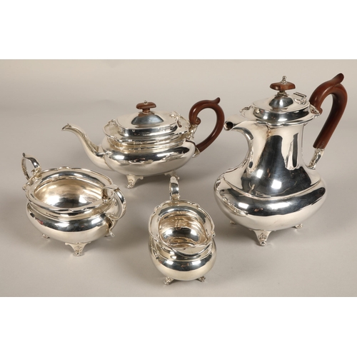 182 - Three piece silver tea service with silver plated coffee pot, assay marked Sheffield 1930, maker Joh... 