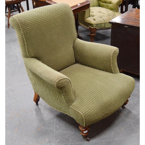 476 - Victorian walnut armchair upholstered in later green fabric, on turned supports and castors, maker's... 