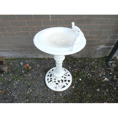 532 - Antique cast iron white painted bird bath, dished circular bowl decorated with two doves on reeded c... 