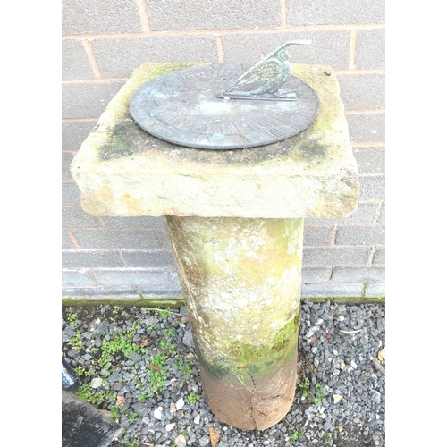 529 - Large sandstone sun dial on plain rounded column. 84cm high, x 35cms wide.