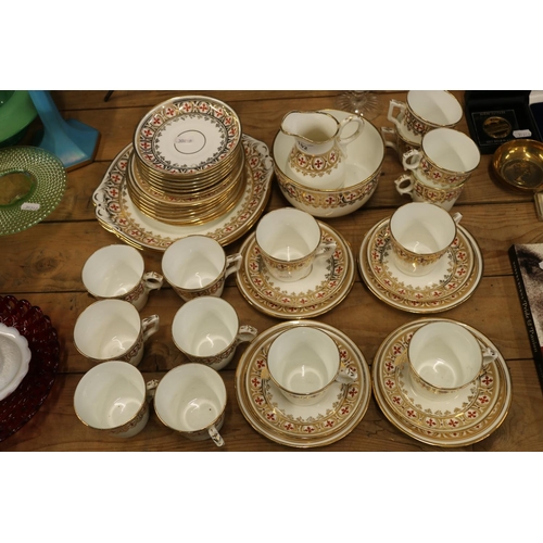 102 - Shelley China, and another matched teaset decorated in gilt with red crosses.