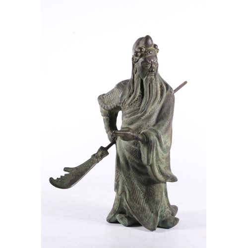 103 - Mid-20th century Chinese patinated bronze figure of an Immortal Warrior holding a weapon.